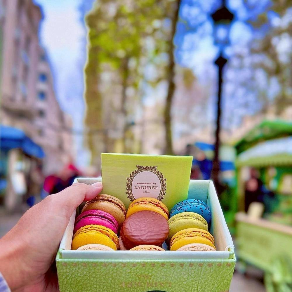 Macaroons in a box in Paris France.