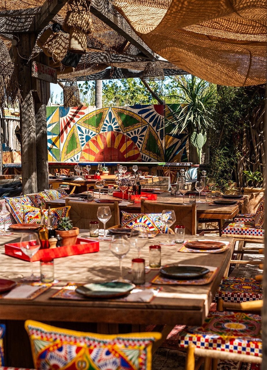 Dolce & Gabbana branded dining area in Casa Amor beach club in Saint Tropez.