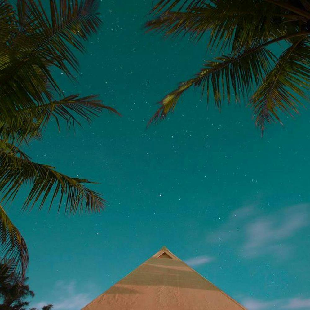 Night sky with stars over Pyramids of Chi in Bali
