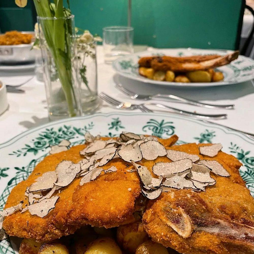 Cotoletta Milanese with potatoes in Milan