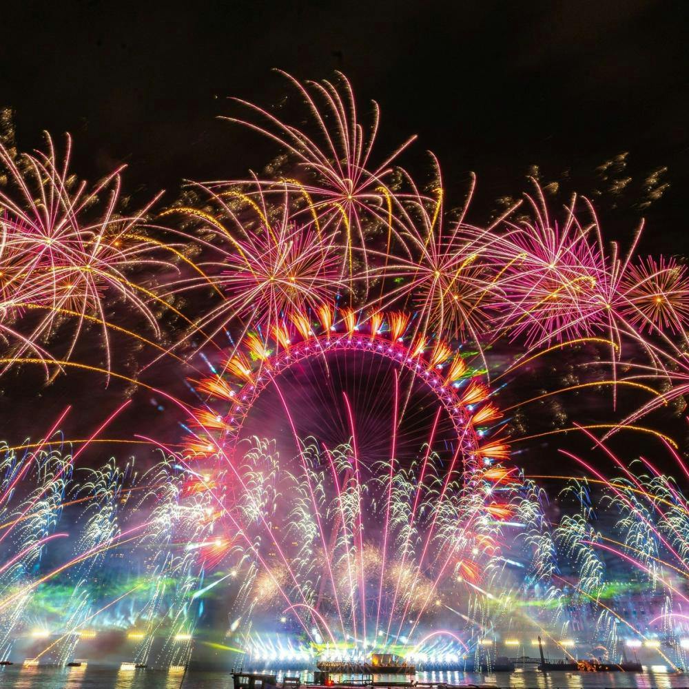 London Eye with fireworks in New Year