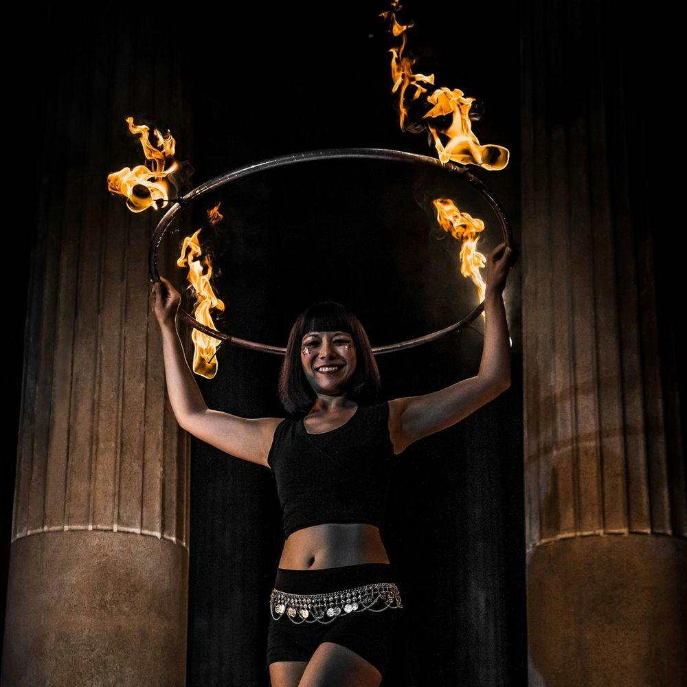 Woman dancing with flames