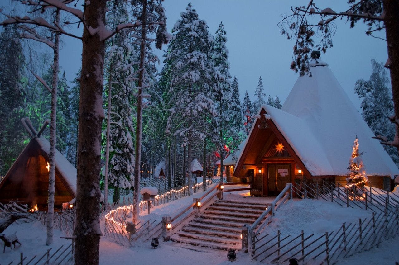 Santa Claus huts covered in snow in Rovaniemi Finland.