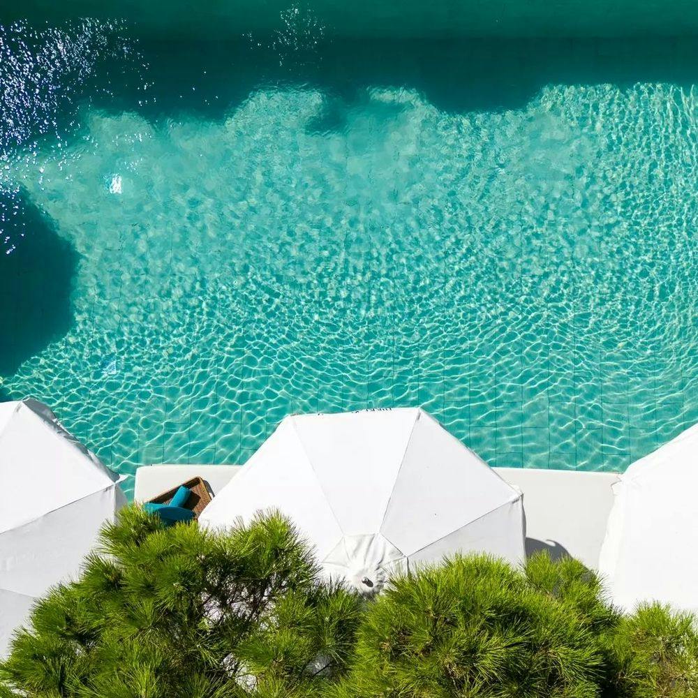 Pool and sun loungers in Saint-Tropez beach club Nikki Beach