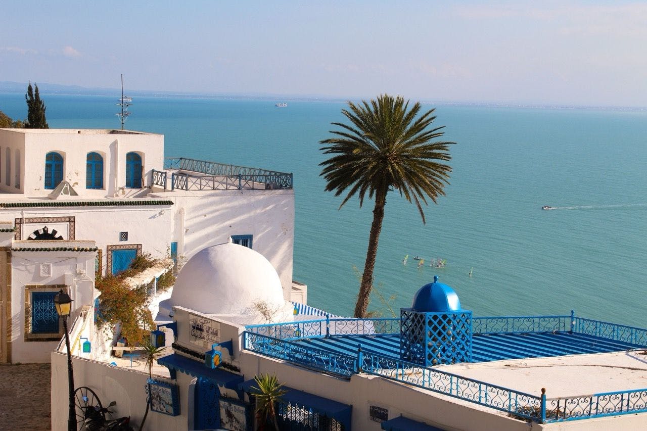 Coastline of Tunisia with blue Mediterranean Sea and boats