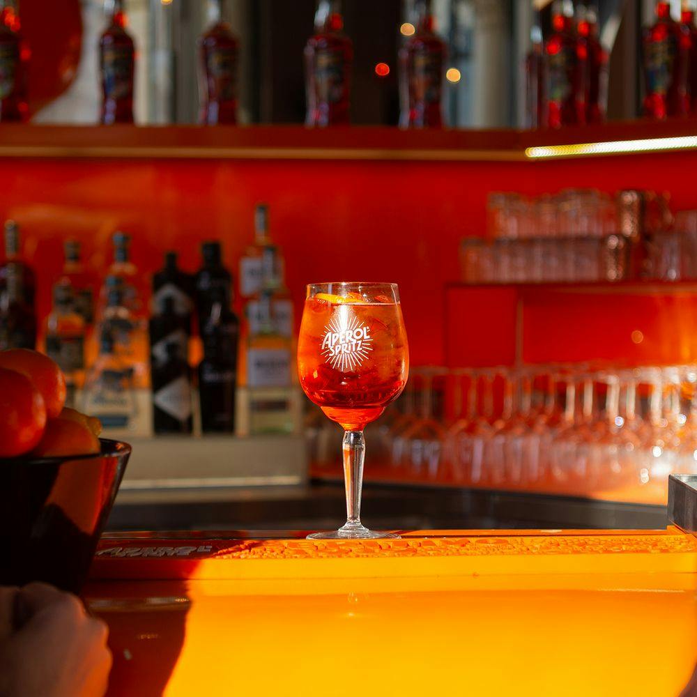 Aperol Spritz cocktail on the bar of Terrazza Aperol in Milan Italy