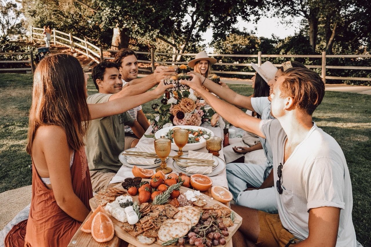 People celebrating in a dinner party in France