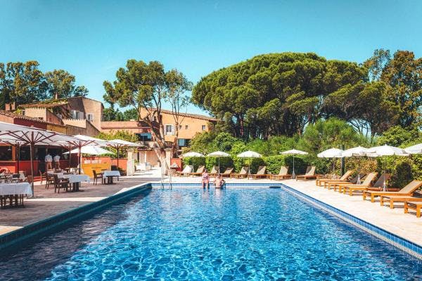 Hôtel La Mandarine pool with sunbeds in Saint Tropez.