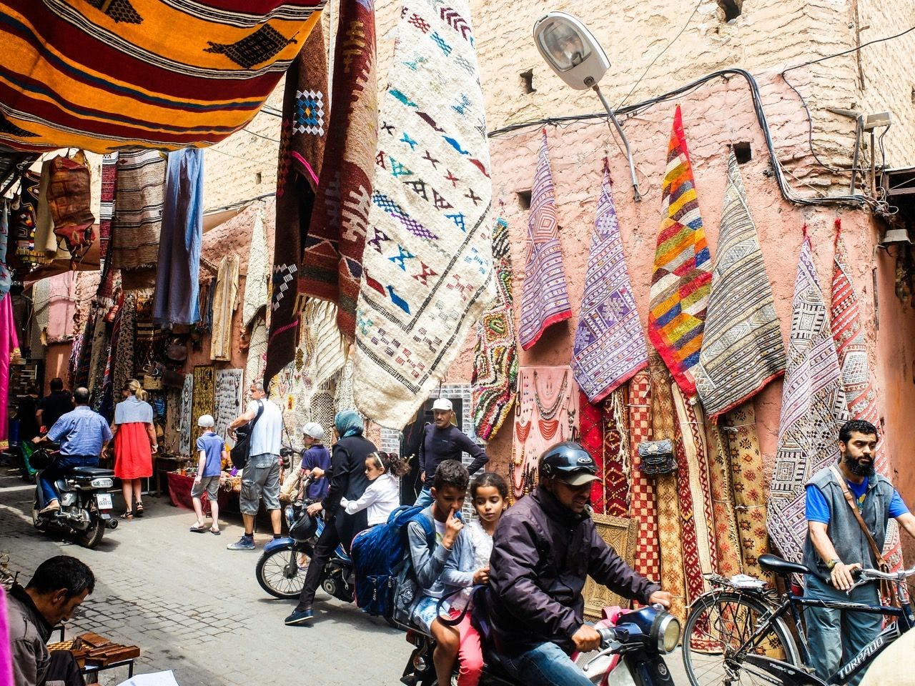 Bustling street market in Marrakesh, Morocco.