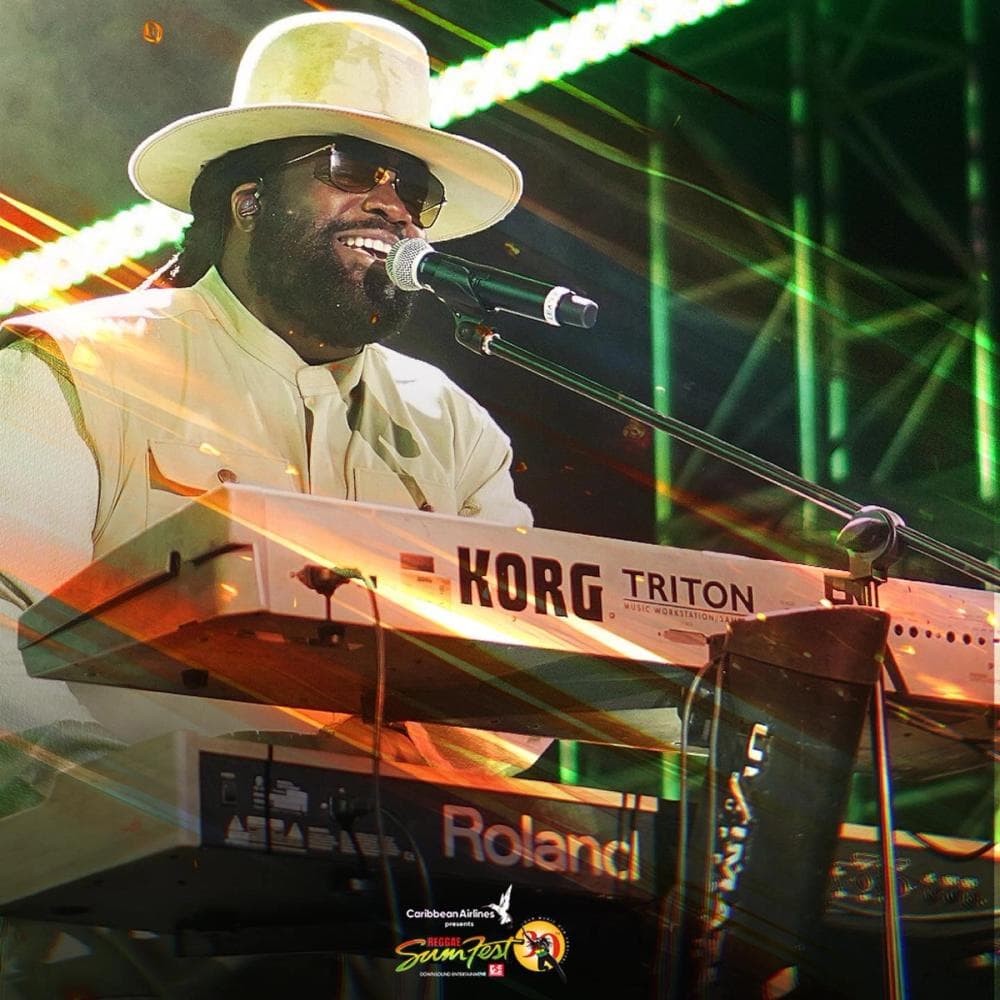 Reggae artist playing piano and singing at Reggae Sumfest in Jamaica.