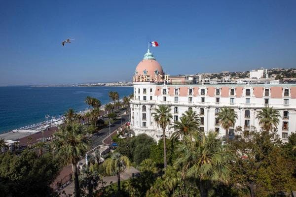 Hotel Le Negresco and seaside in Nice France.