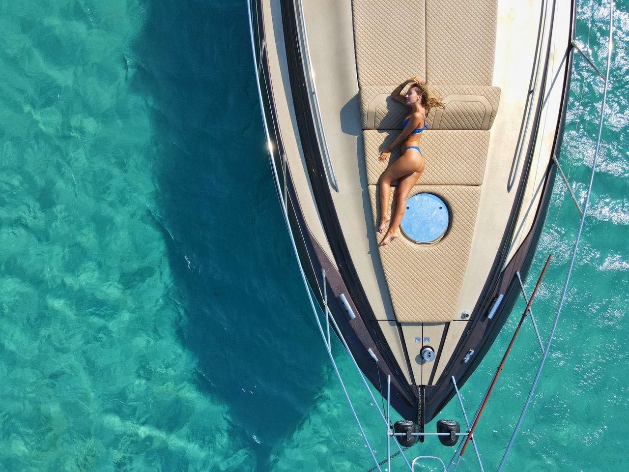 Woman on the deck of a luxury yacht on Caribbean
