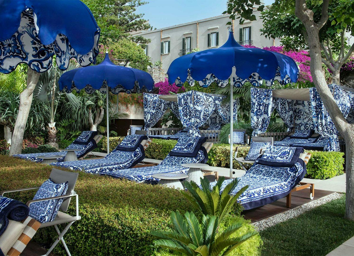 Dolce & Gabbana branded sun loungers in the courtyard of San Domenico Palace resort.