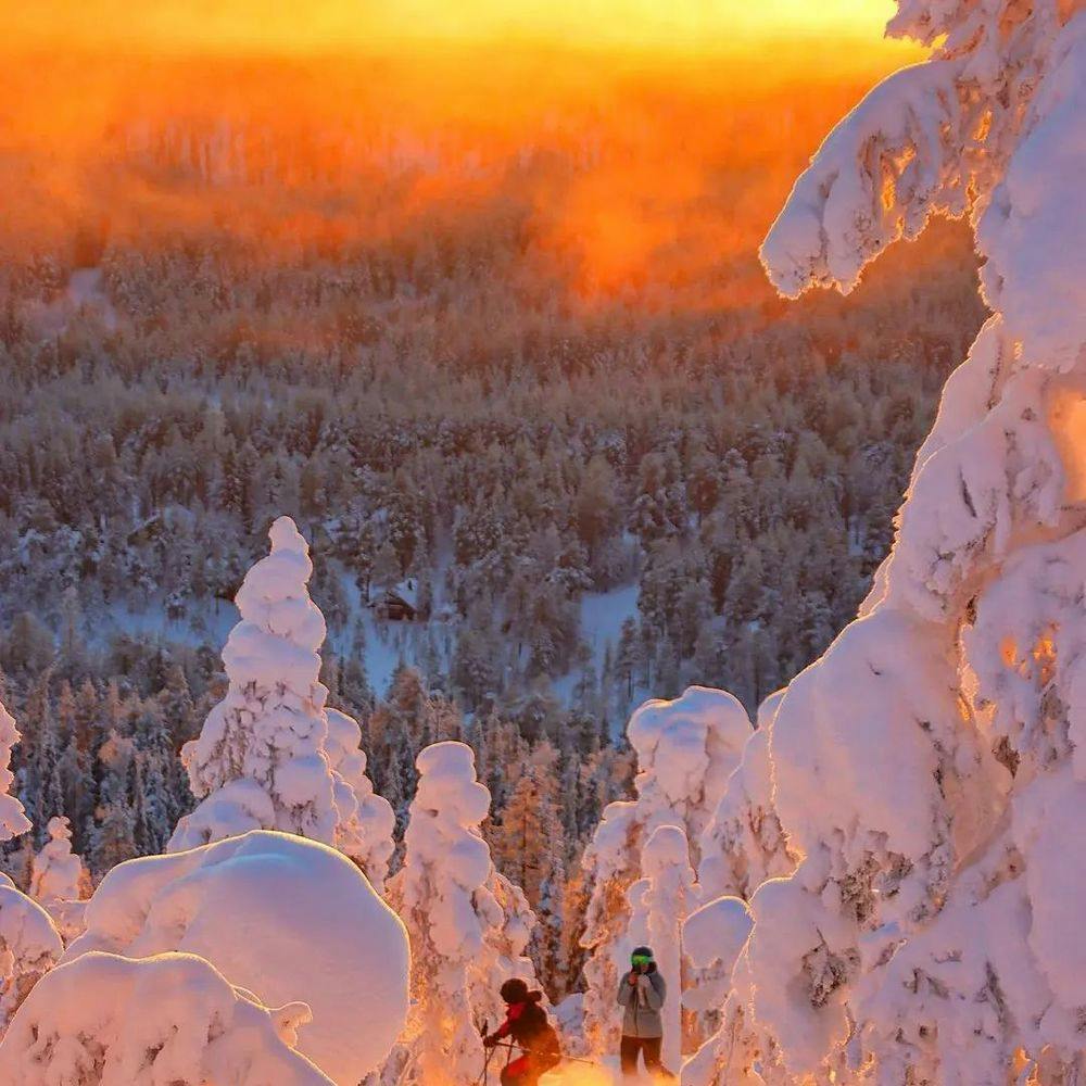 People skiing in snow in Lapland Finland