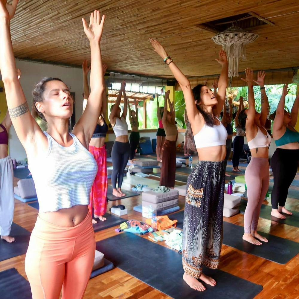 Women doing yoga in Samyama Meditation Center in Ubud Bali