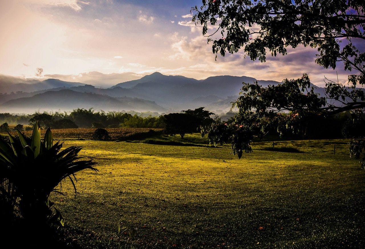 Sunrise in Colombia's coffee region with views on the mountains.