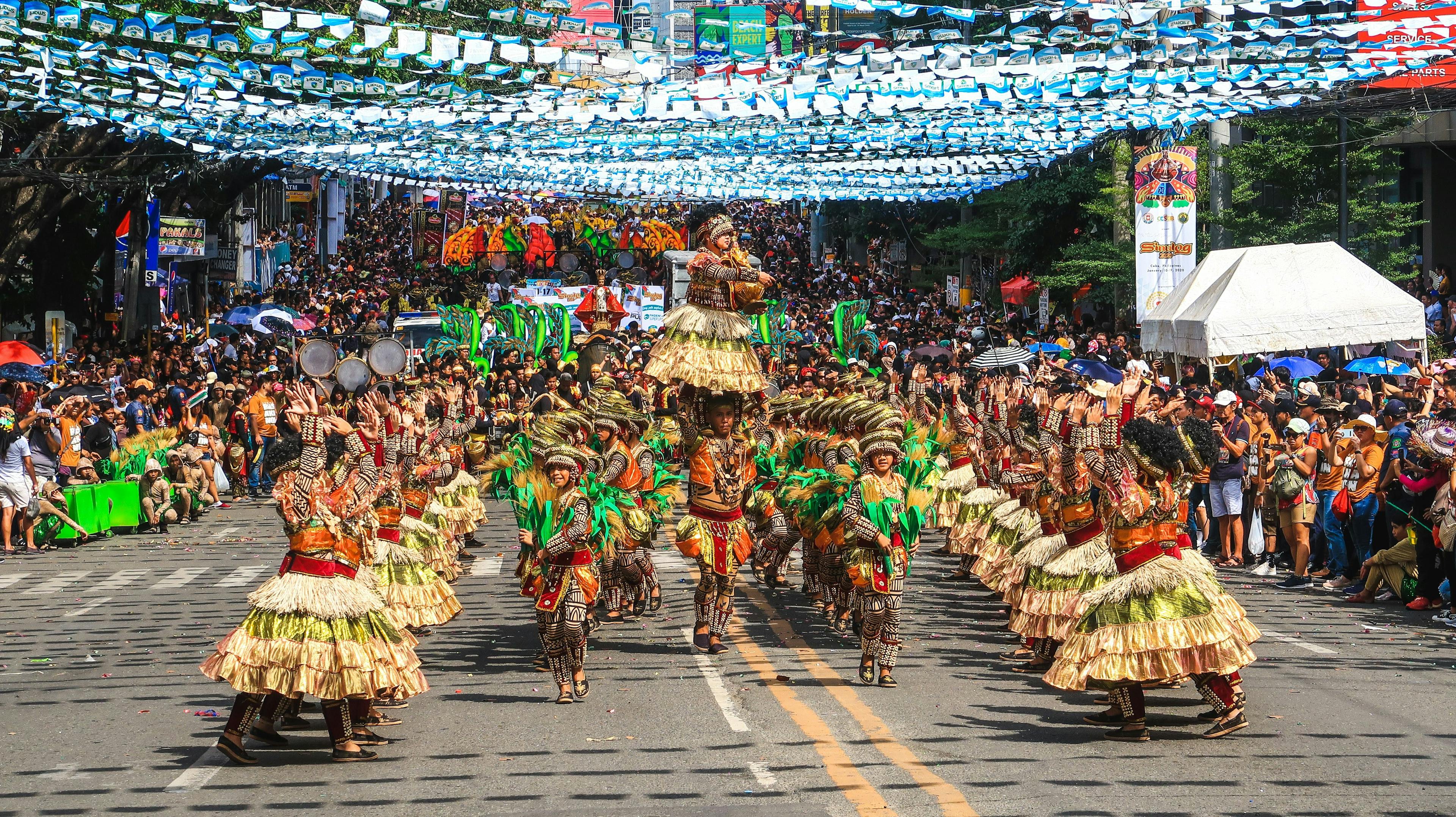 Locals dancing on the street in Sinulog Festival in Cebu Philippines.