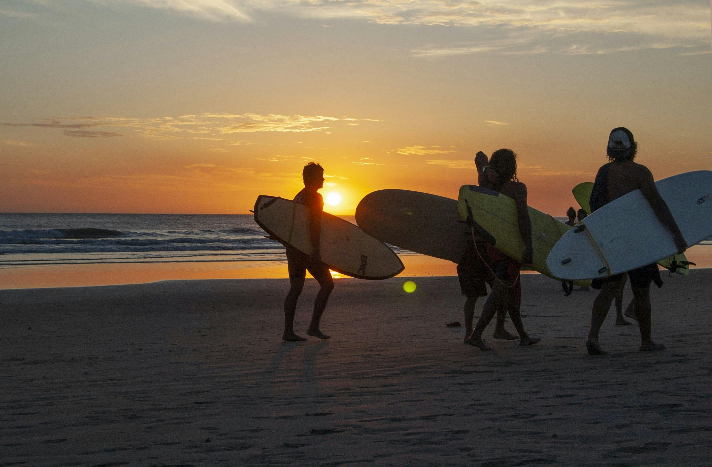 Surfers in Playa Grande, Guanacaste, Costa Rica.