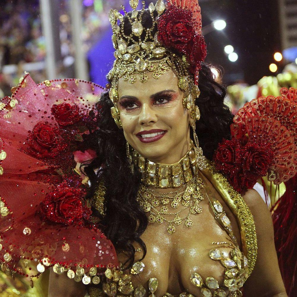Woman in red costume in Rio Carnival.