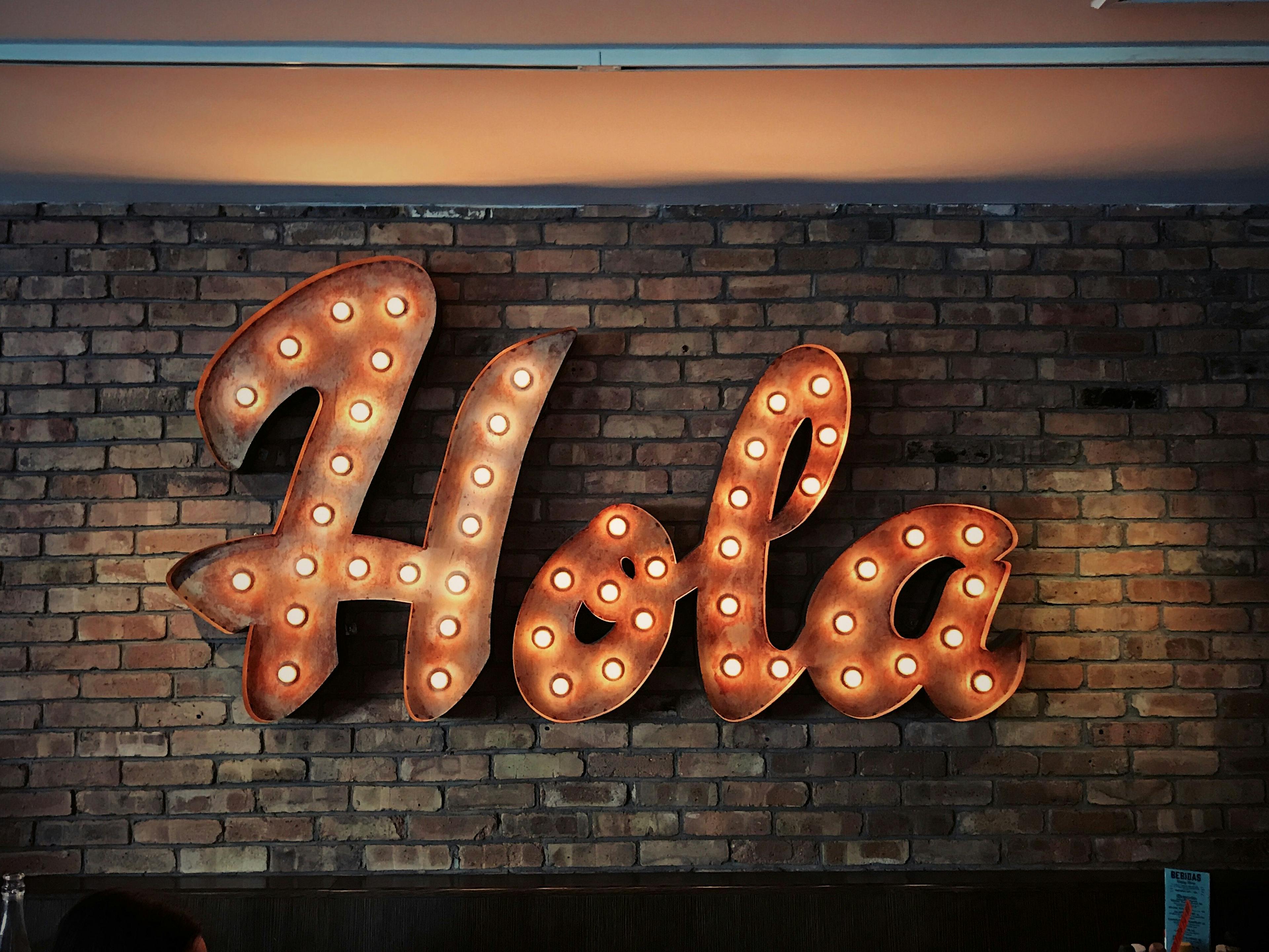 Wall with a text saying Hola