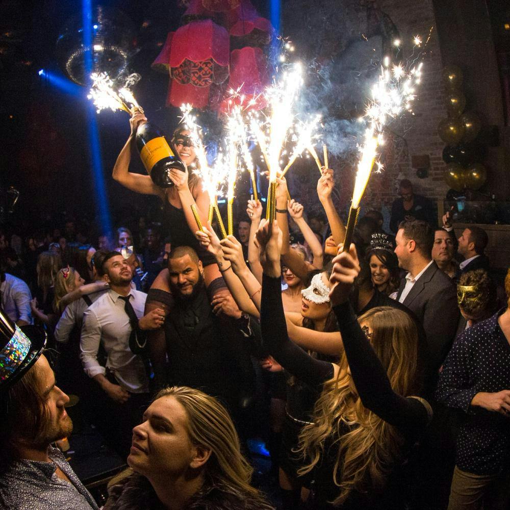 People celebrating New Year in Tao Downtown in New York