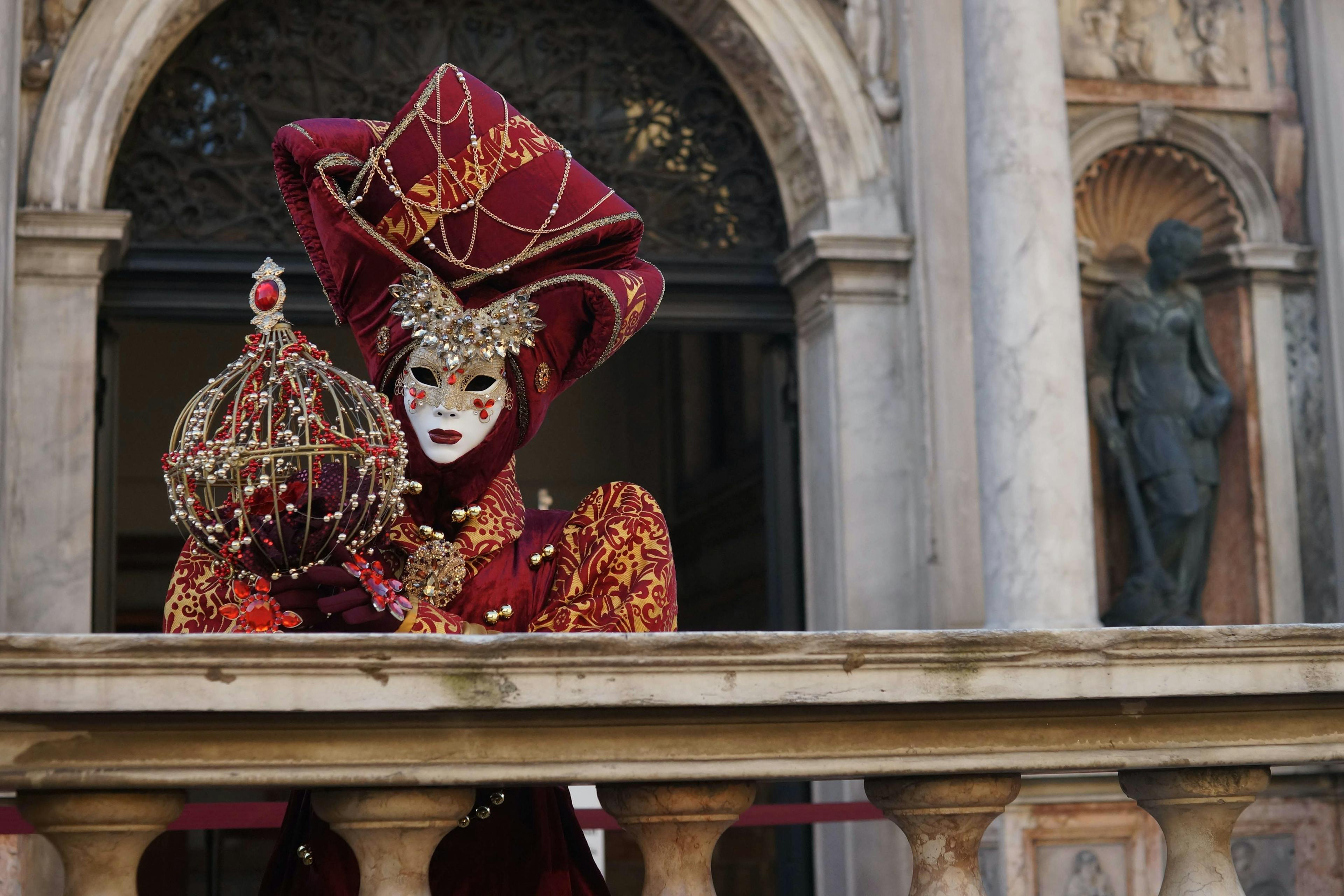 Woman wearing costume and mask in Venice carnival.