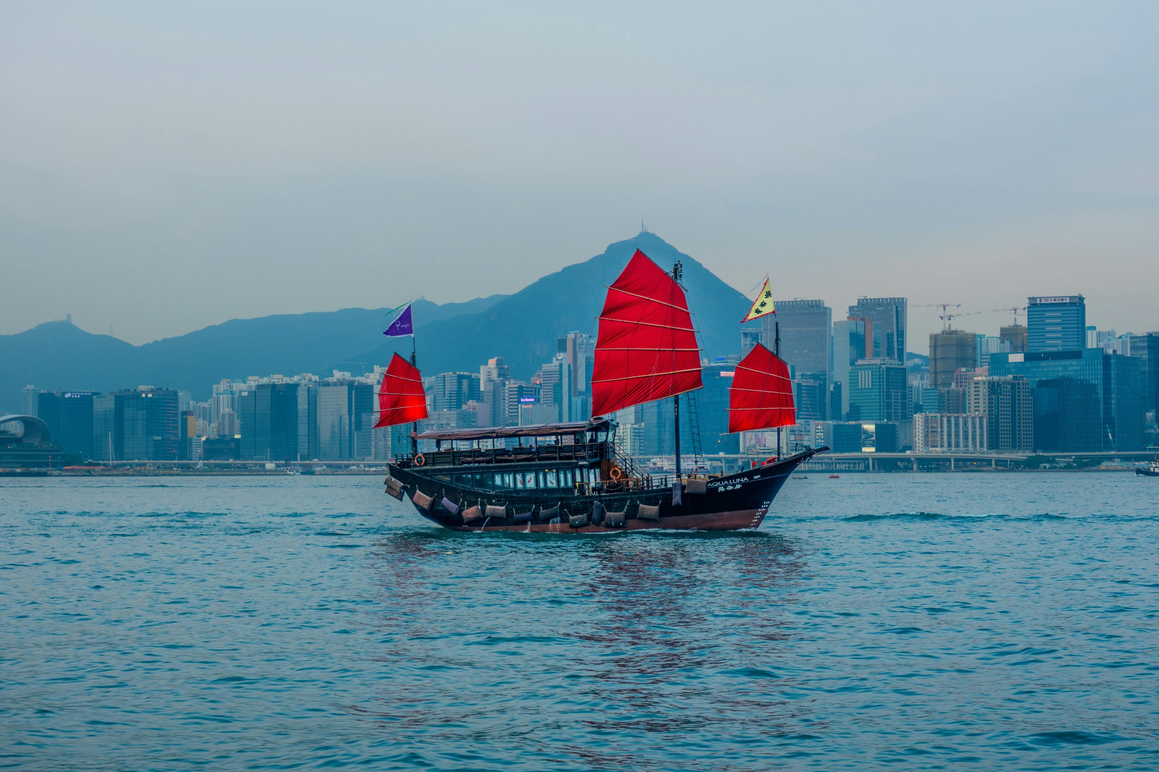 Boat with red sails in Hong Kong
