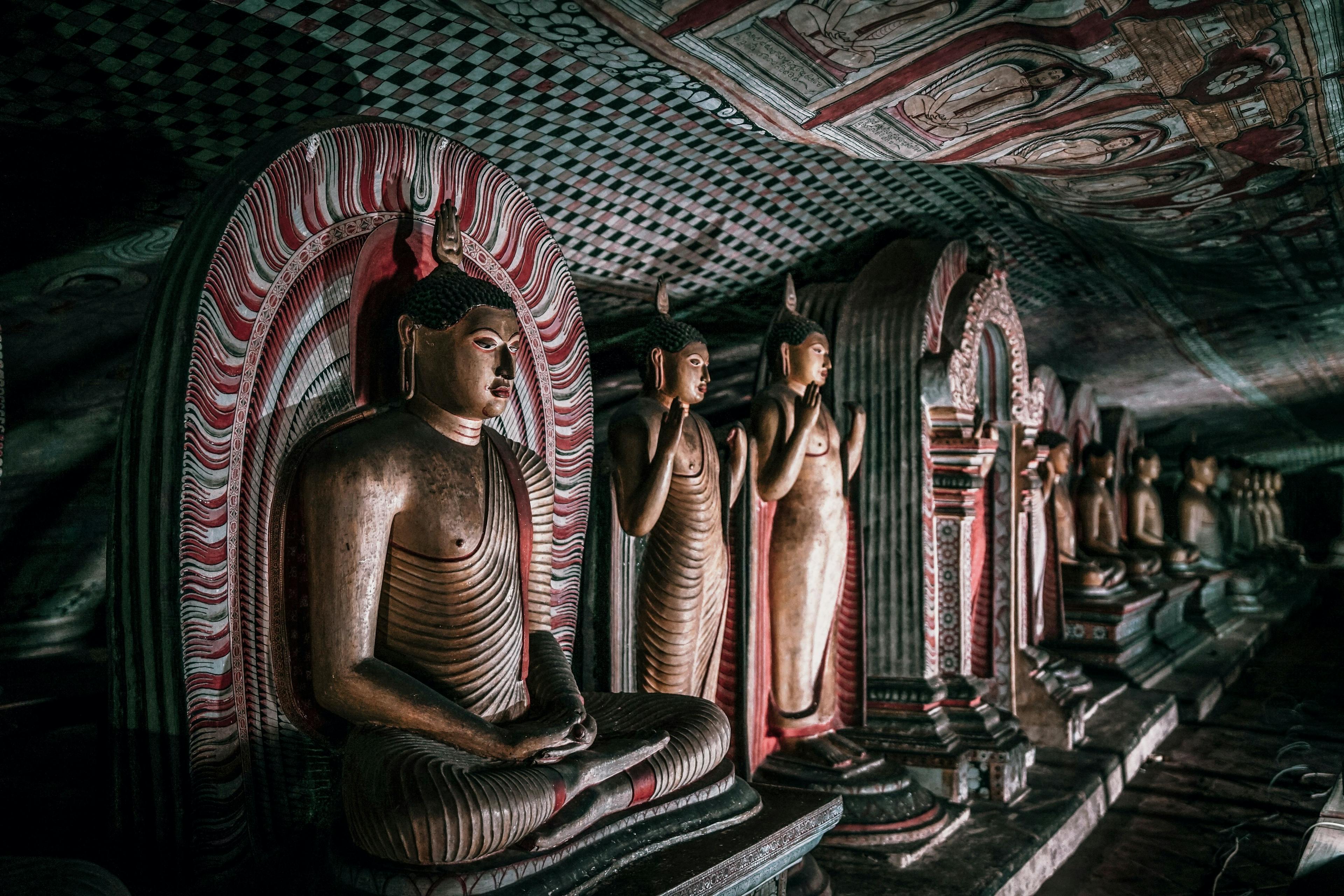 Numerous Buddhas in Dambulla Cave Temple in Sri Lanka.