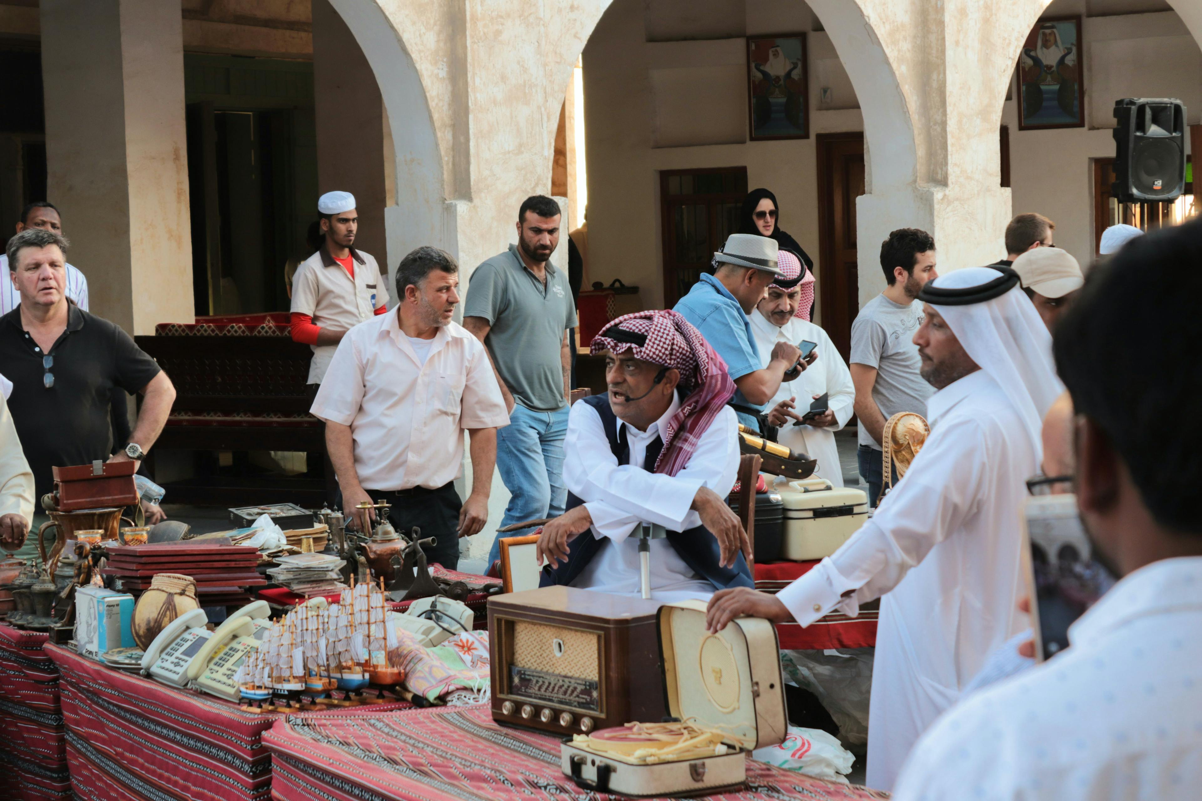 Locals selling merchandise in Souq Waqif in Doha, Qatar.
