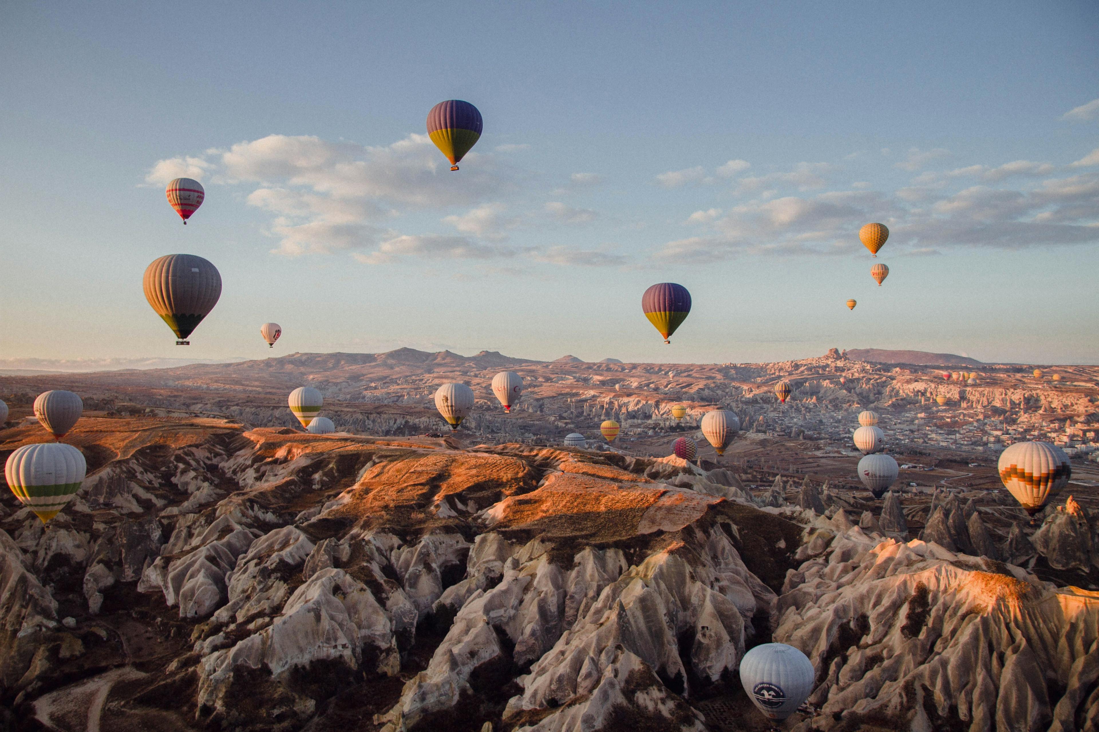 Hot air balloons flying over Cappadocia in Turkey.