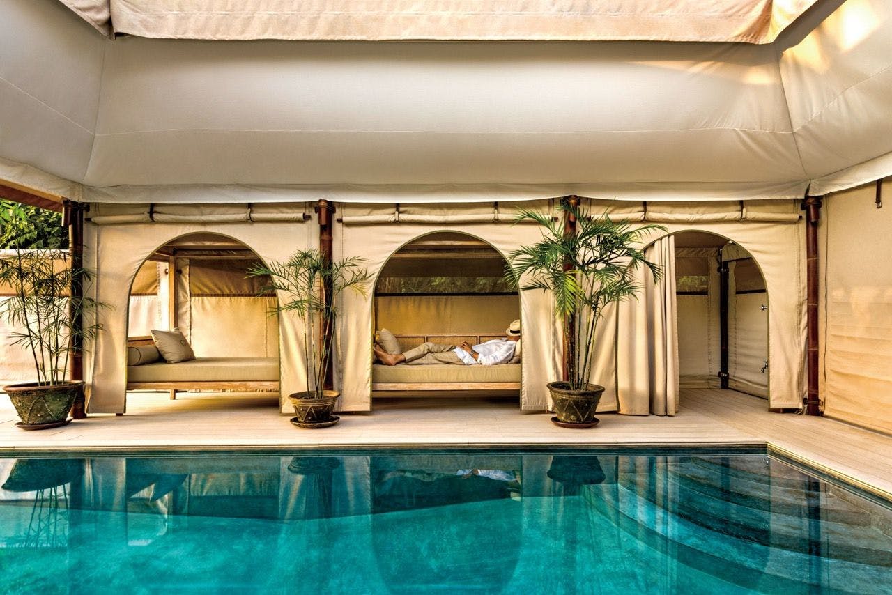 Inside the living room of a luxurious tented house in Bali