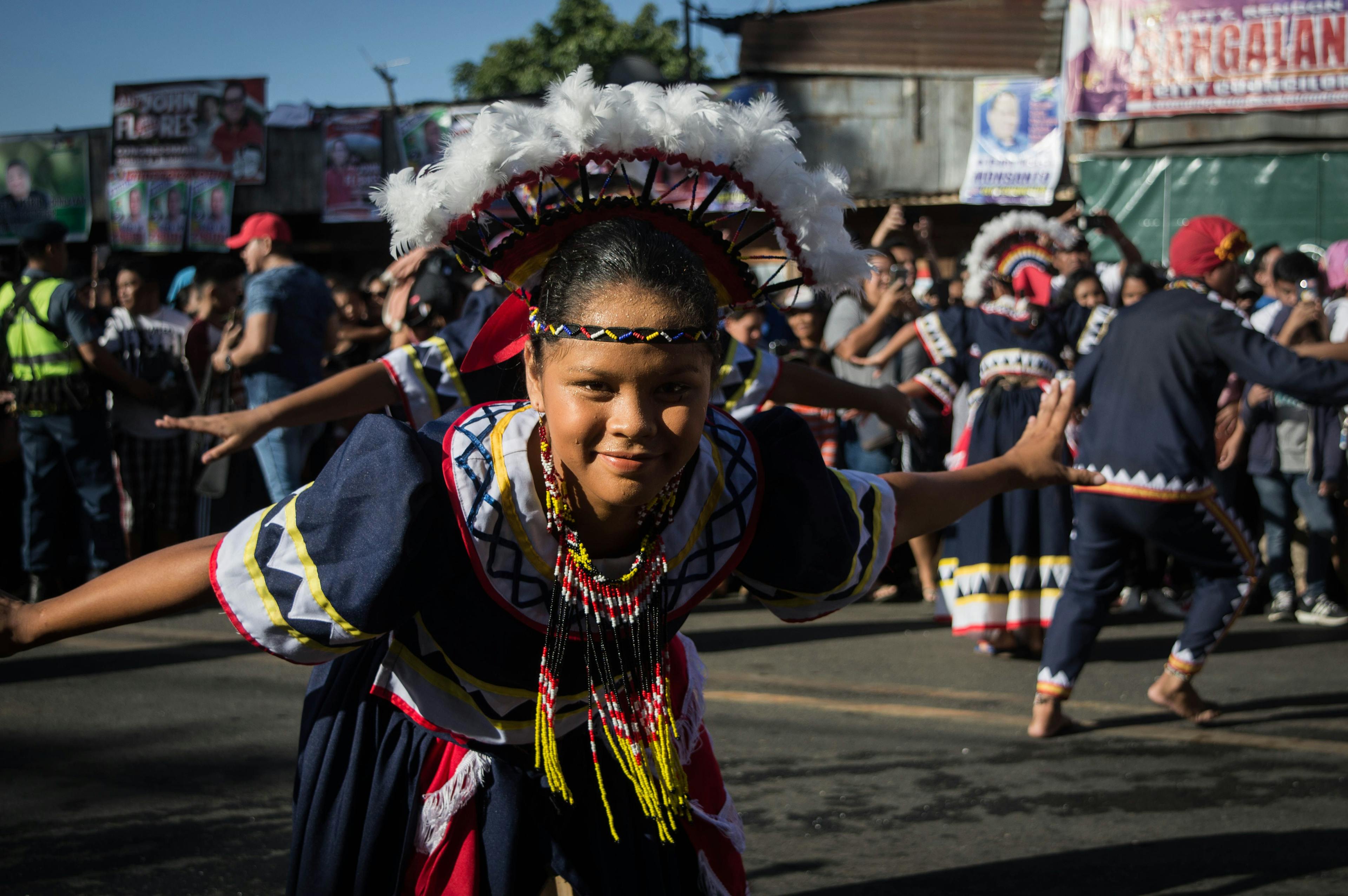 Girl dancing on the street festivities in Malaybalay, Bukidnon, Philippines.