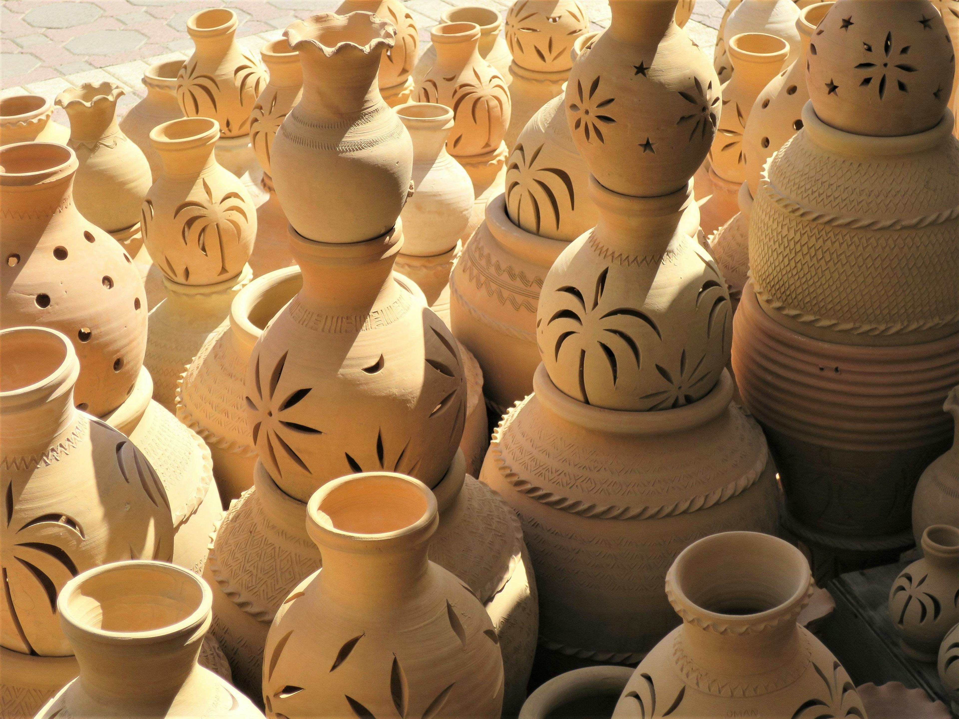 Pottery for sale in Omani market.