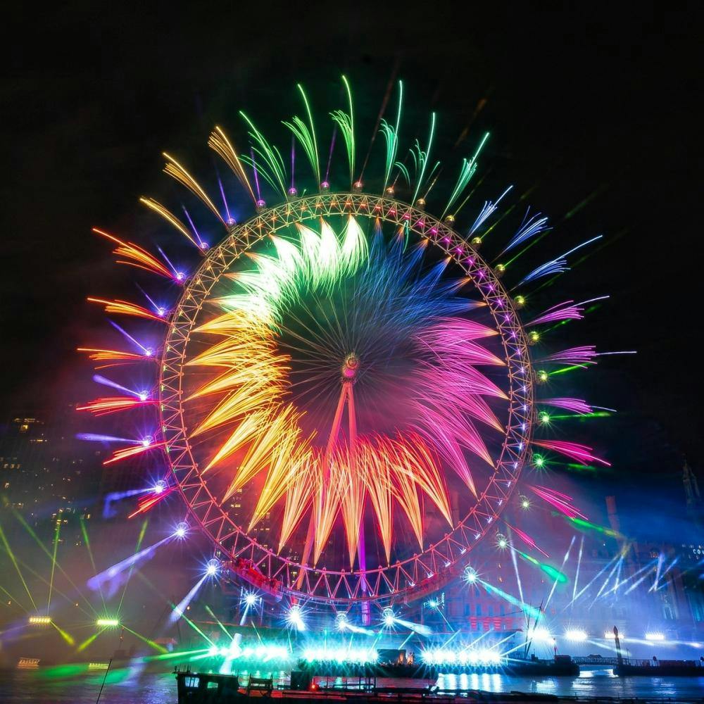 London Eye with colorful fireworks in New Year