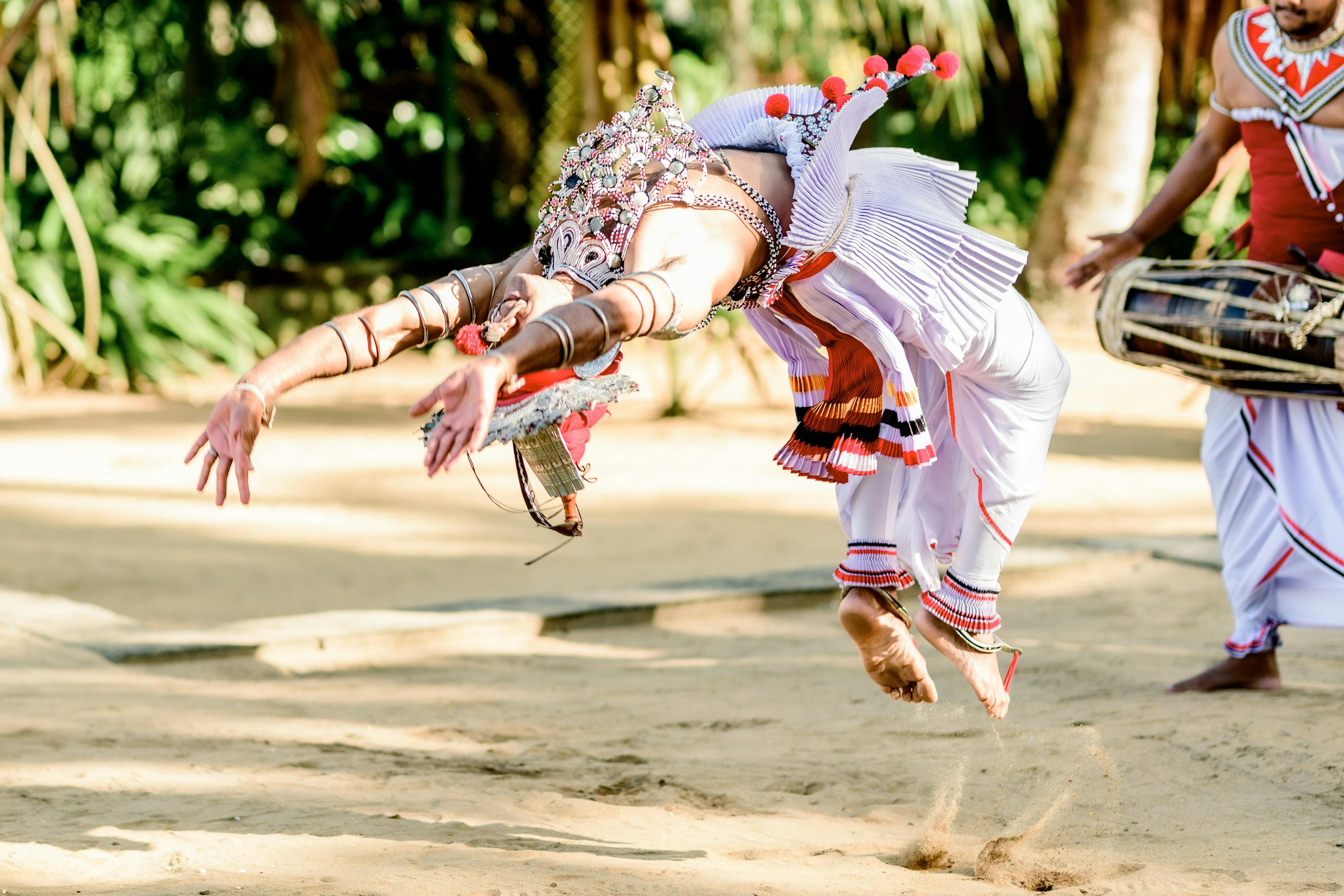 People performing Kandyan dance in Sri Lanka.