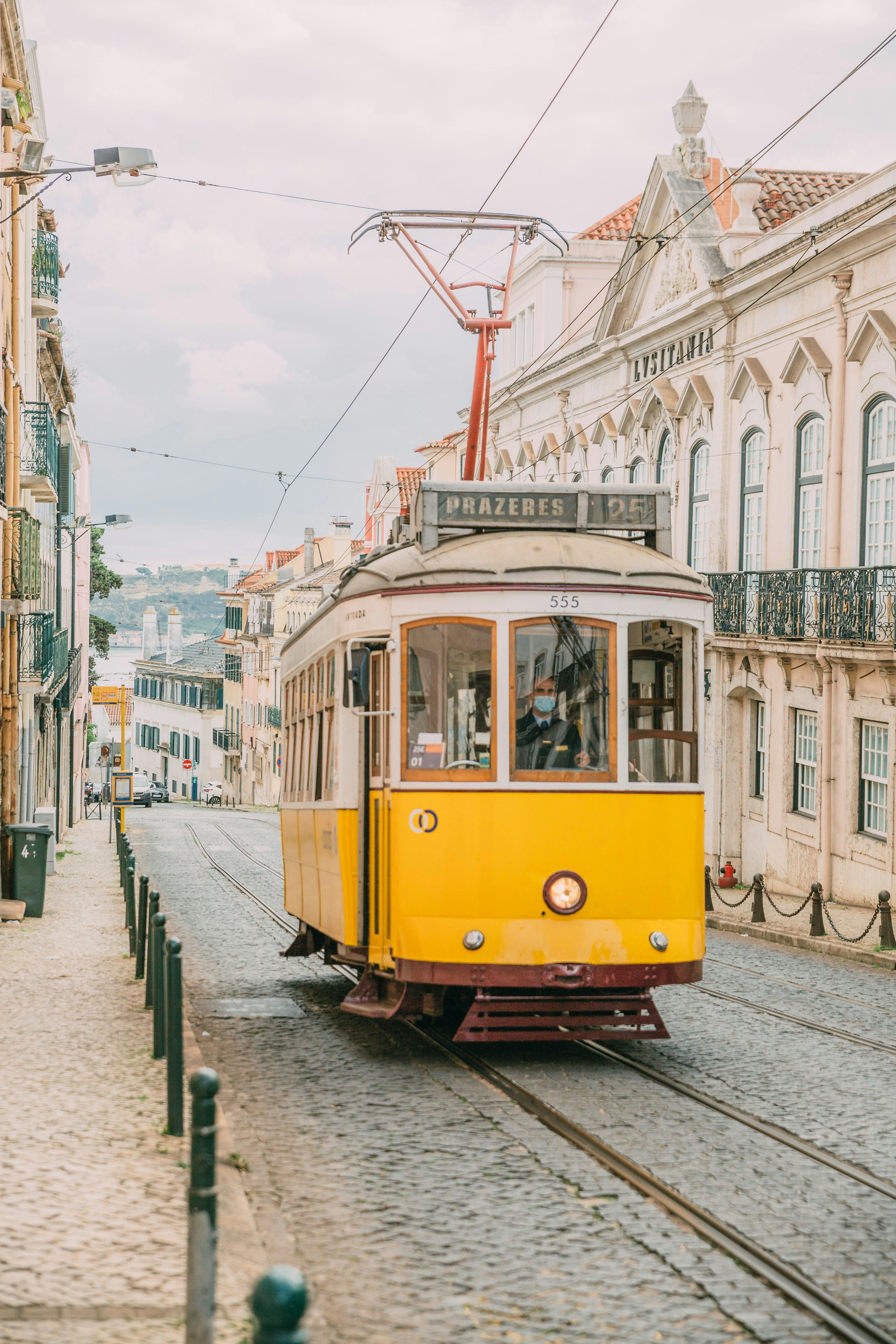 Historical yellow tram in Lisbon.